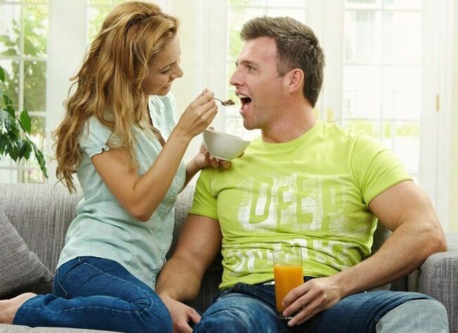 woman feeds male products to increase potency